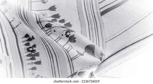 White silk fabric and black stripes  White   black threads create textured stripes this sheer cotton  blend fabric  Lightweight   lightly textured  the possibilities are endless 