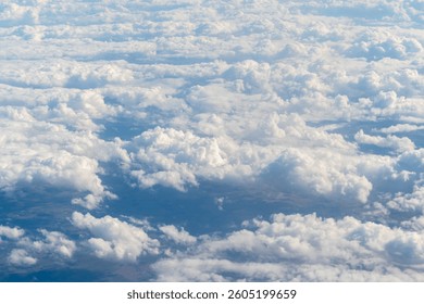 White and silver clouds background, view from airplane