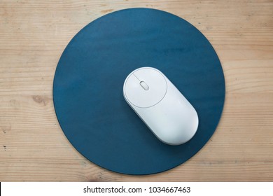 Premium Photo  Computer mouse on white mouse pad isolated on a white  background top view