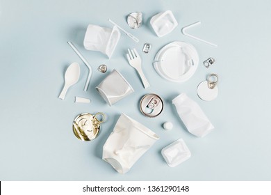 White single use plastic on  blue background. Concept of Recycling plastic.  - Shutterstock ID 1361290148