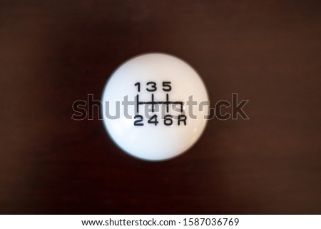 White six speed shift knob for sports car