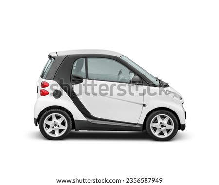 White small 2-occupant city car isolated on white background with clipping path. Side view.