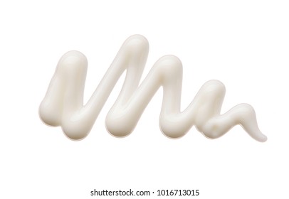 White smear of cosmetic cream isolated on white background. Creamy foundation texture isolated. Smear of face cream isolated. Texture of cream on white background