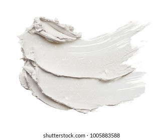 White Smear And Texture Made With Face Clay Or Cream Isolated On White Background. 