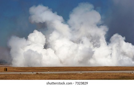 White Smoke Billowing On Runway