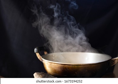 White smoke from cooking pot on stove in countryside kitchen. soft picture - Powered by Shutterstock