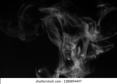white smoke overlay effect on solid super black background. Nature motion smoky steam wave abstract environment pollution, cloud, cigarette, gas, dry ice, chemistry, factory and ghost concept - Shutterstock ID 1380894497
