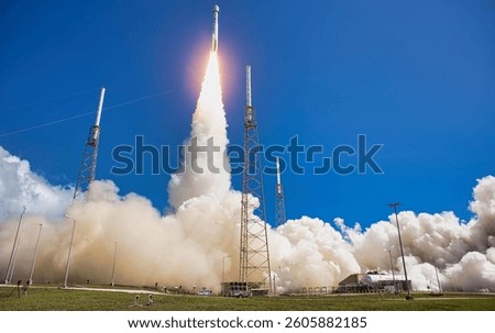 White smoke from pipes. A stunning shot of a rocket launching into space. Rocket launch with fiery exhaust at sunset near a testing facility. Elements of this image furnished by NASA