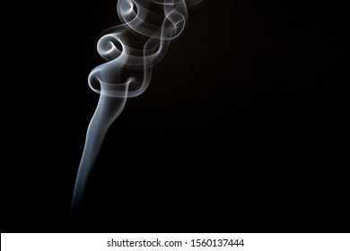 White Smoke Plume On A Black Background