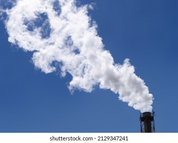 White Smoke Rising From The Factory Chimney