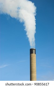 White Smoke Stack On Blue Sky