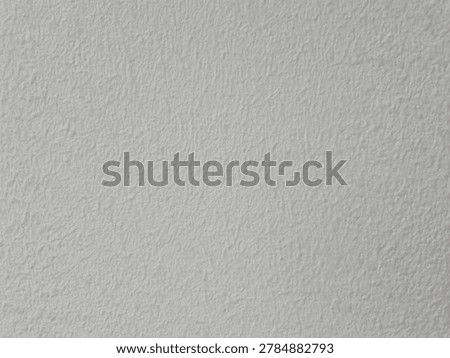 white, smooth, and seemingly ribbed, flat wall.