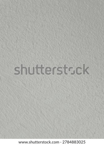 white, smooth, and seemingly ribbed, flat wall.