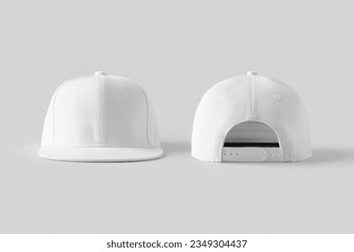 White snapback caps mockup on a grey background, front and back side.