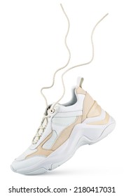 White sneaker with flying laces stands on the tip isolated on white background. Running sports shoe with clipping path. Full Depth of Field - Shutterstock ID 2180417031