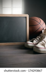 White Sneakers With Basketball And Blank Blackboard With Copy Space.