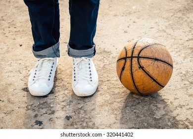 White Sneakers With Basketball On Ground