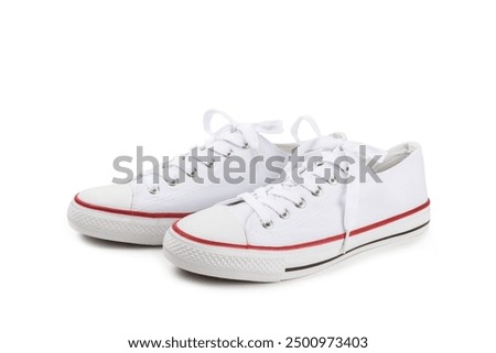 White sneakers, trainers isolated on white background. Unisex casual sports shoes. Top view. Space for text. Copy space.Stylish sport shoes. Trendy footwear