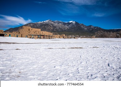 White Snow Covered Taos Pueblo New Mexico The Land Of Enchantment And Home To The Southern Sangre De Cristo Mountains Of The Desert Southwest And Native Tribes