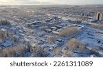 White and snowy landscape from the village. Aerial view of beautiful winter weather in Korso Vantaa, Finland