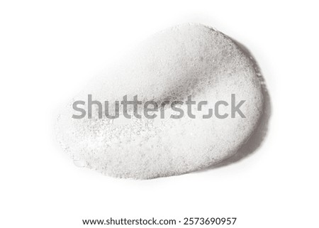 White soap foam sample drop isolated on white background. Face mousse swatch.
