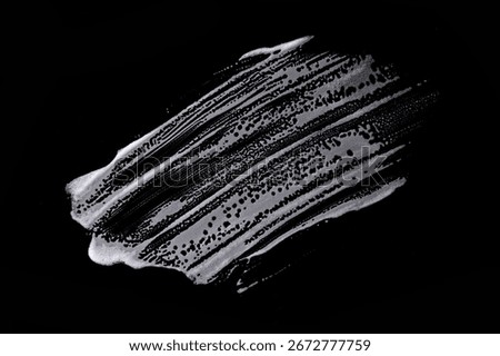 White soapy foam texture. Shampoo foam with bubbles.White facial foam creamy bubble soap sponge isolated on black background.