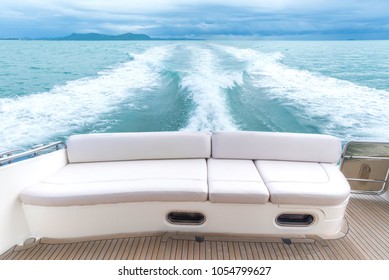 White sofa set on a luxury yacht stern interior comfortable design for holiday recreation tourism travel and vacation concept