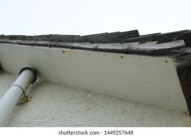 White Soffit Board From An English Cottage. Wooden Soffit Board From A Roof In England.