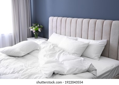 White Soft Pillows On Comfortable Bed Indoors