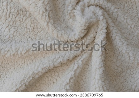 White soft plush lamb wool fabric background