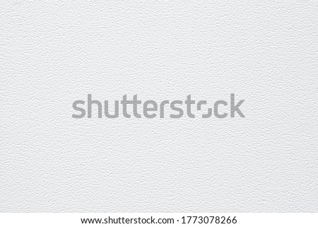 White soft porous embossed texture as background