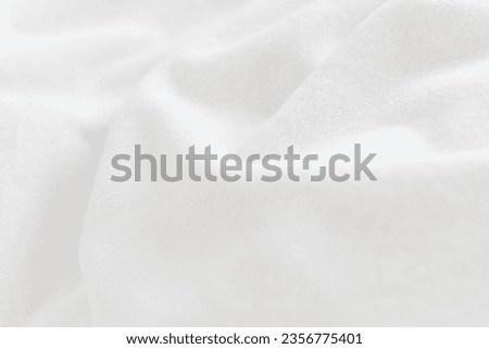 White soft wrinkle fleece blanket texture background, with space for texts. 