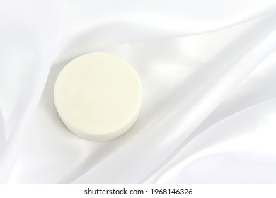 White Solid Soap Shampoo Bar On Silk Background, Bath Cosmetics