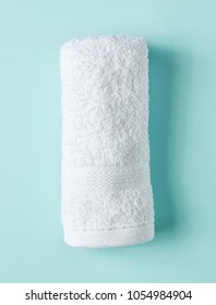 White Spa Towel On Light Blue Background, Top View