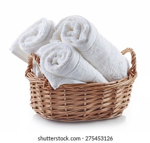 White Spa Towels In A Basket Isolated On White Background
