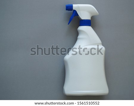 Similar – White Spray Bottle Nozzle on Black Background