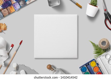 White Square Canvas Mockup With Various Art Objects