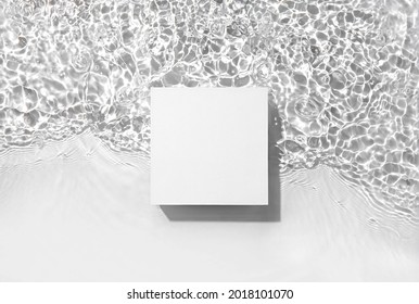 White Square Podium On The Water Surface Background. Flat Lay, Copy Space. 