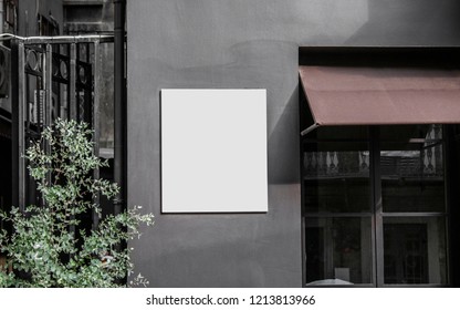 White Square Signboard On The Wall