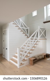 White Staircase In A Modern Farmhouse Style Interior