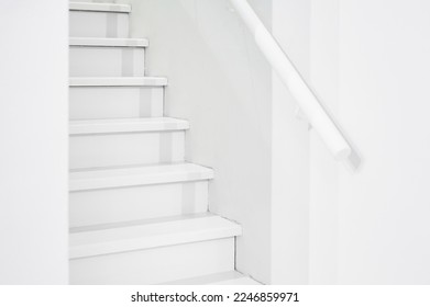 white staircase with steps up