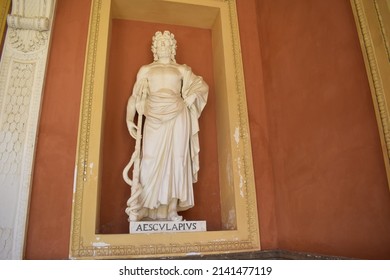 White Statue Of Asclepius, A Hero And God Of Medicine In Ancient Greek Religion And Mythology, Inside The Orto Botanico Di Palermo (Palermo Botanical Garden)