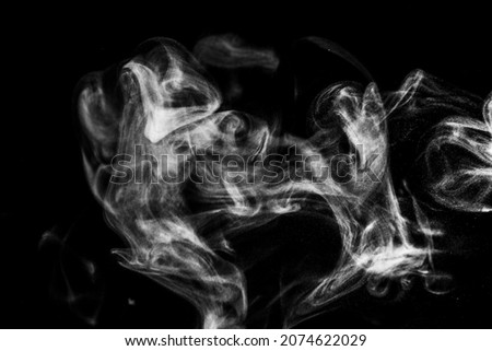 White steam smoke on solid black background with abstract blur motion wave swirl use as an overlay effect for vapor cigarette dry ice hot water and food soup