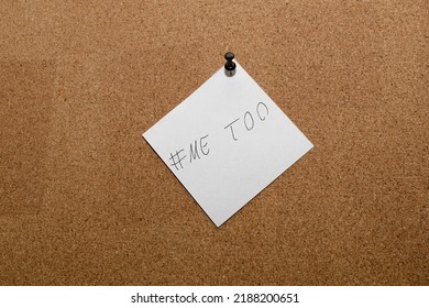 White Sticky Note With Phrase #me Too  On Cork Board With A Black Pin Concept