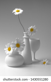 White Still Life With Two Vases, A Wine Glass And Chamomile Flowers.