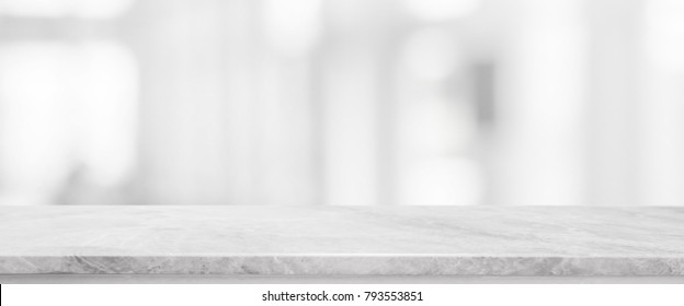 White stone marble table top and blurred abstract background from interior building banner background - can used for display or montage your products. - Shutterstock ID 793553851