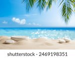 White stone podium with copy space for product display on tropical summer sand beach background