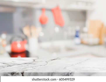 White stone table top and blurred kitchen interior background - can used for display or montage your products.