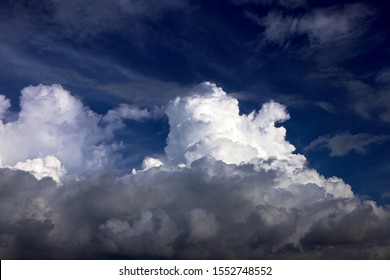 White Stratocumulus In Blue Sky