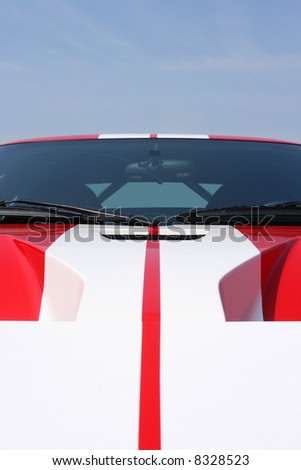 White stripes on a red super car bonnet